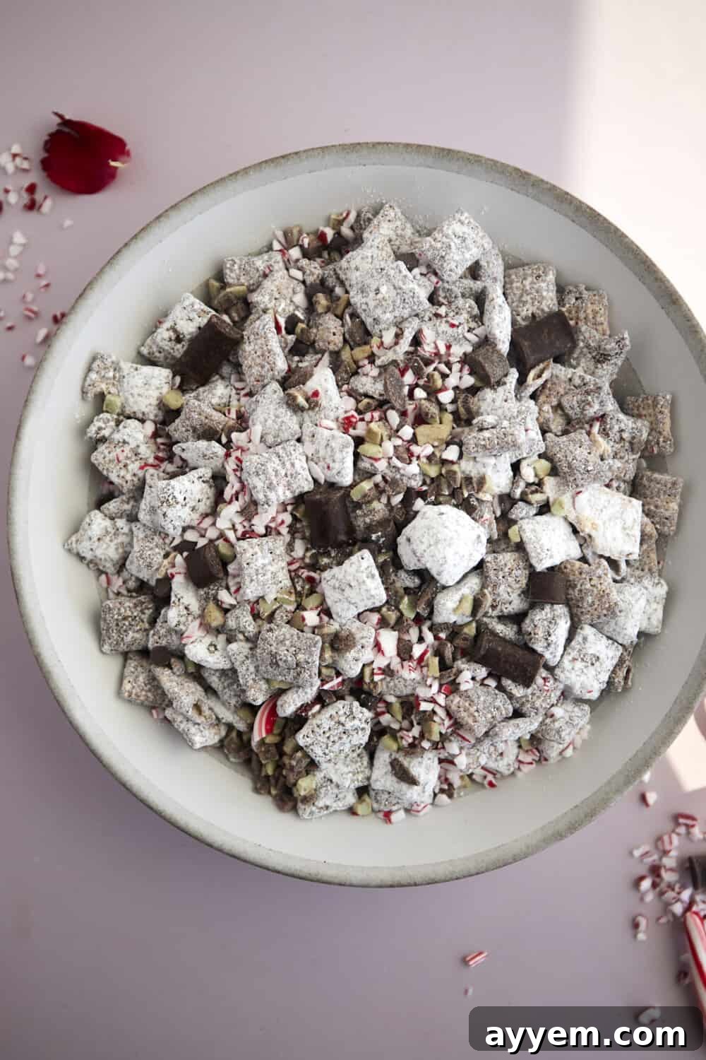 a bowl of chocolate peppermint Christmas puppy chow.