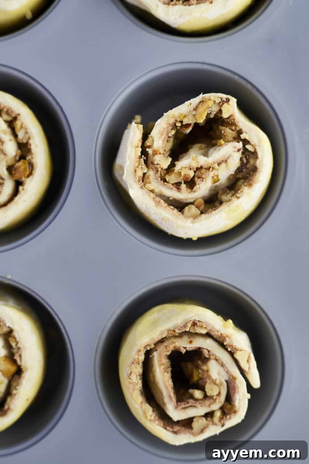 Baked Baklava Puff Pastry Cinnamon Rolls fresh out of the oven, ready for honey.