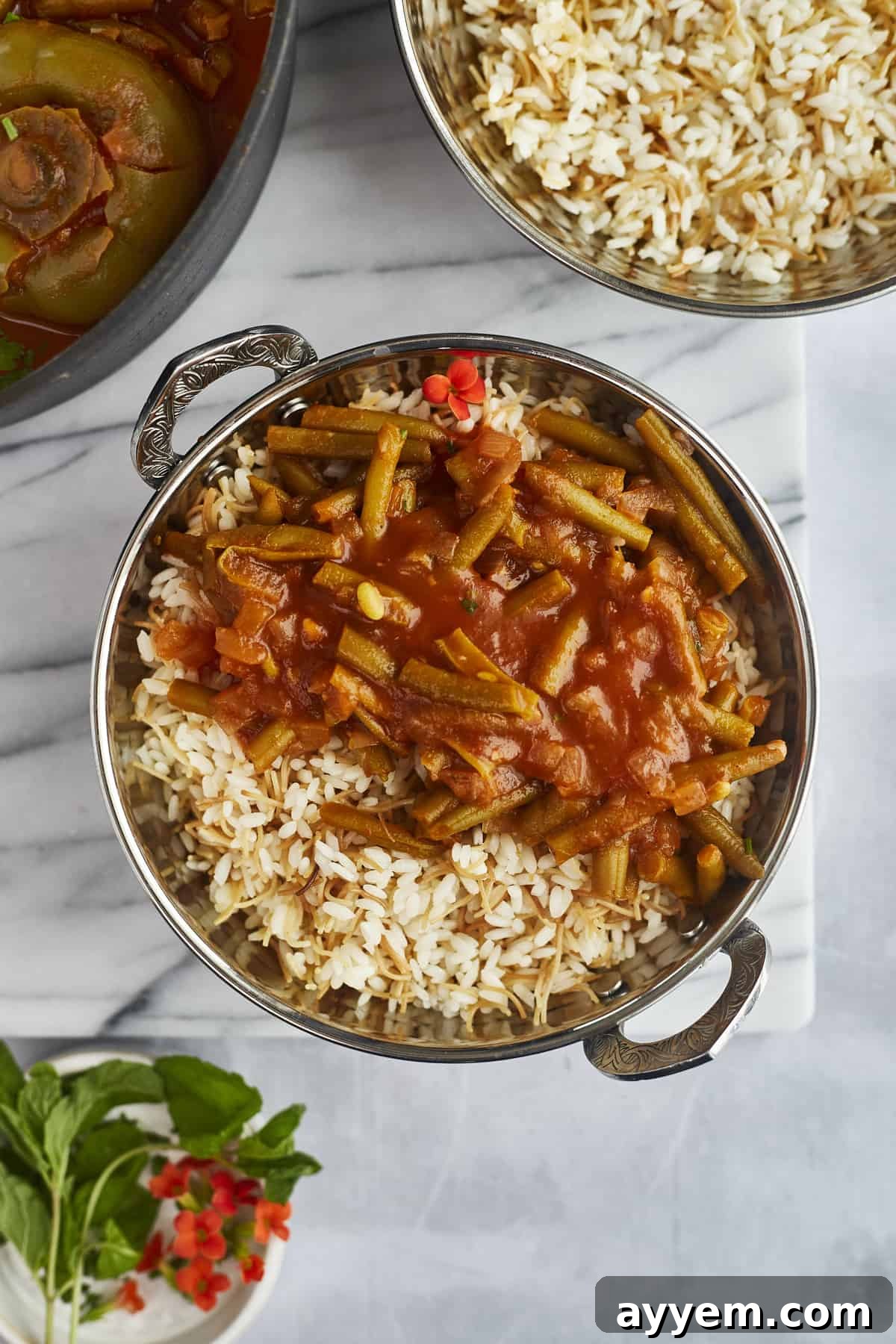 overhead image of green bean stew served over rice