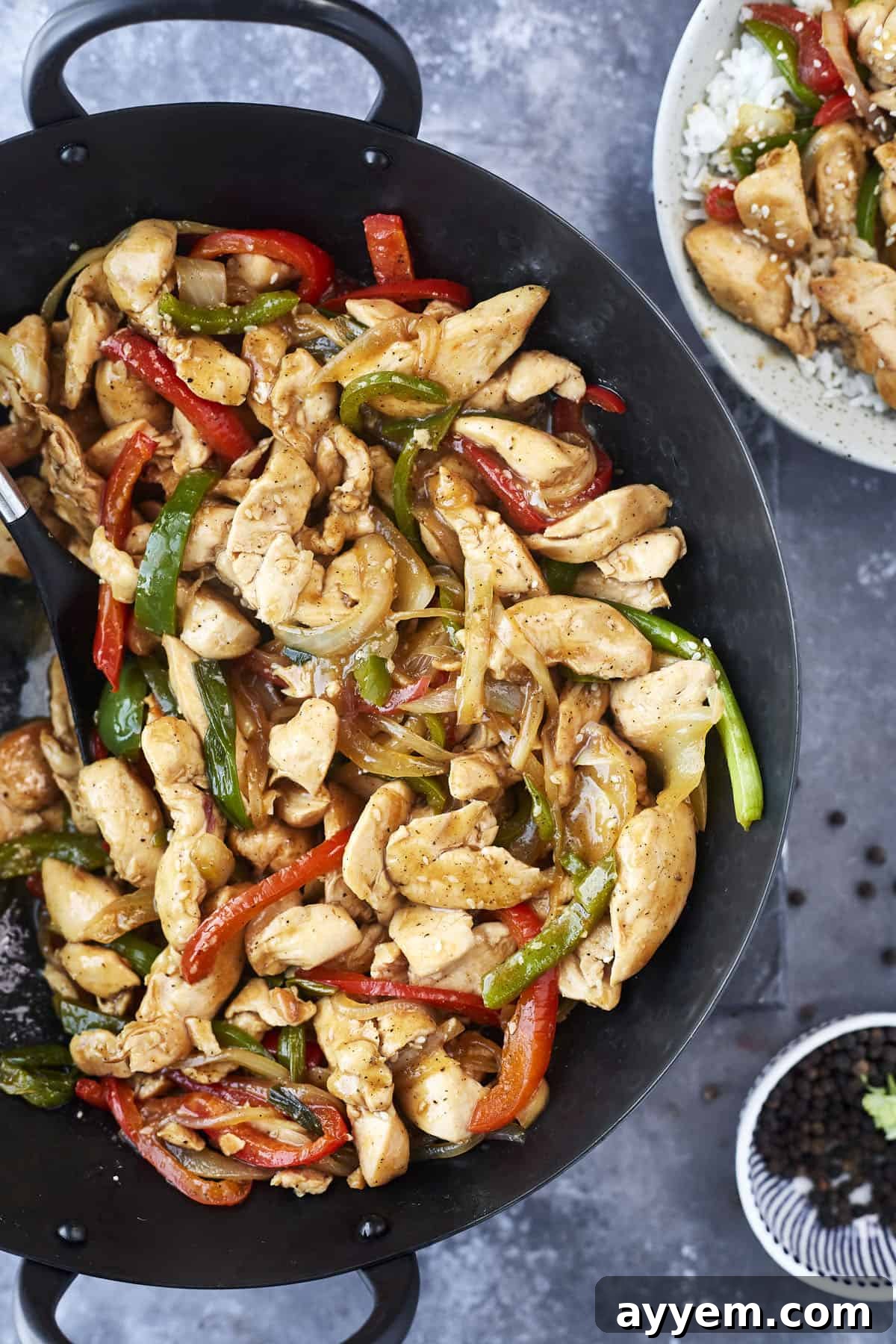 a skillet full of black pepper chicken