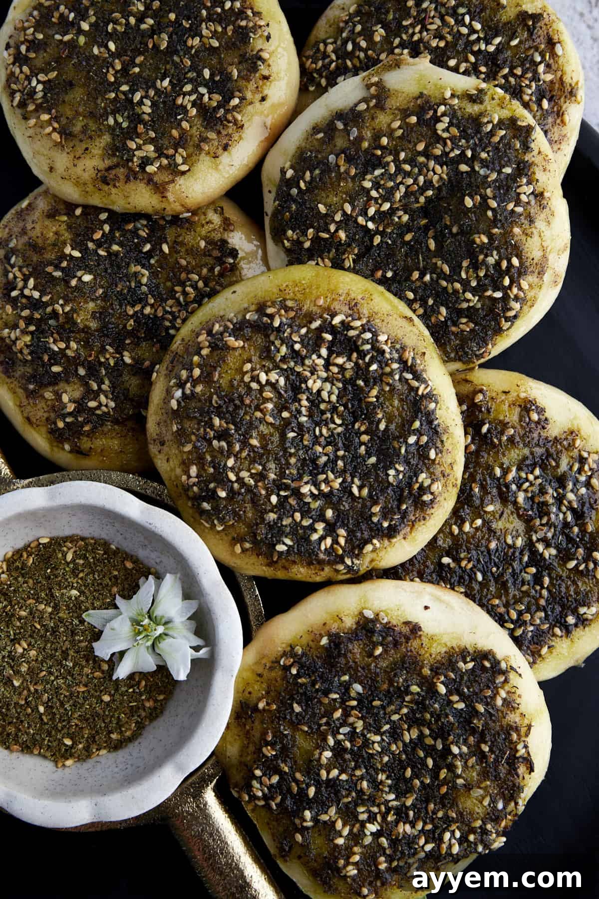 Lebanese Flatbread Wonders 3 A delectable pile of golden-brown Za'atar Manakeesh, ready to be enjoyed