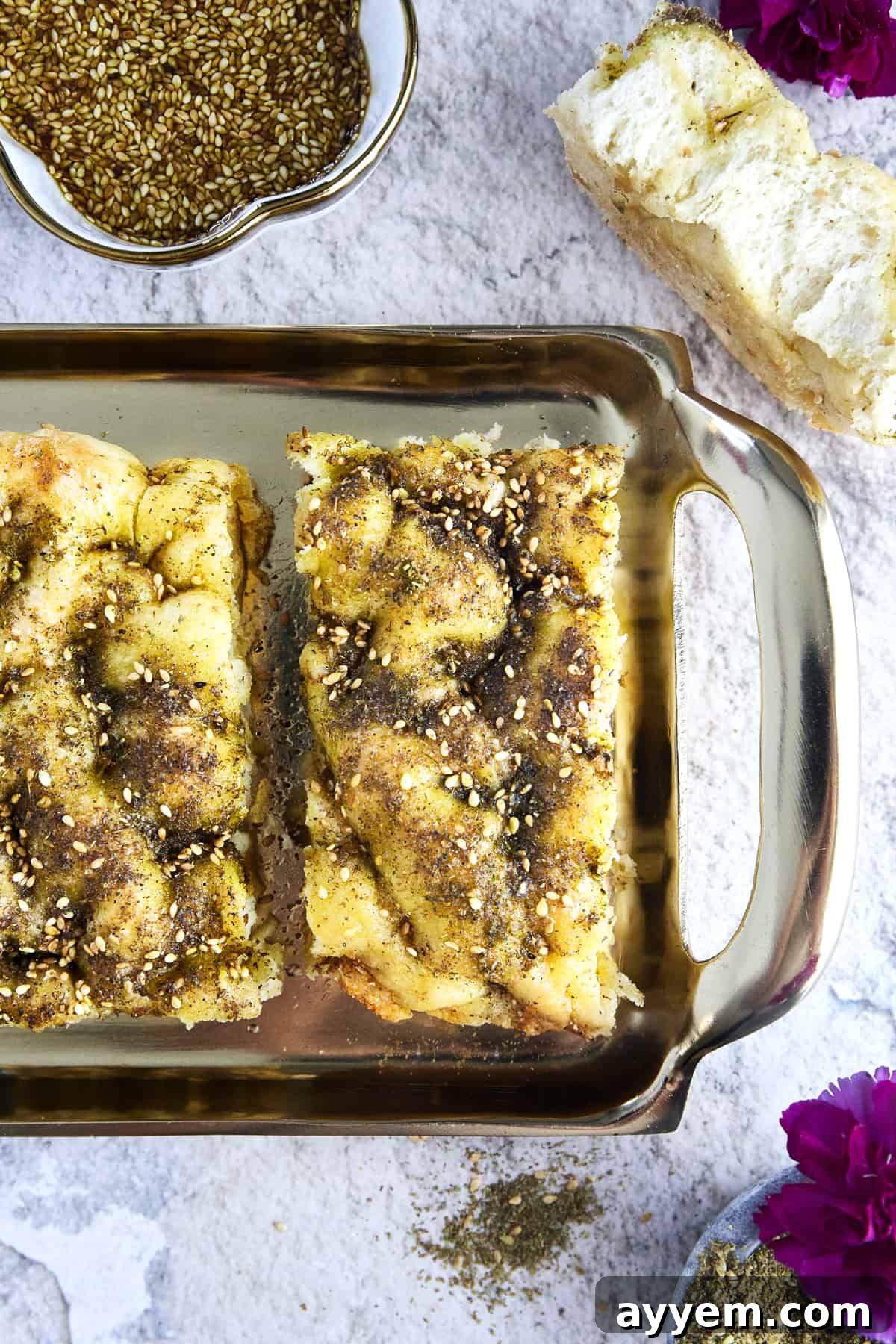 A golden brown Quick Focaccia Recipe with Za'atar Seasoning, ready to be served as an easy and flavorful side dish.