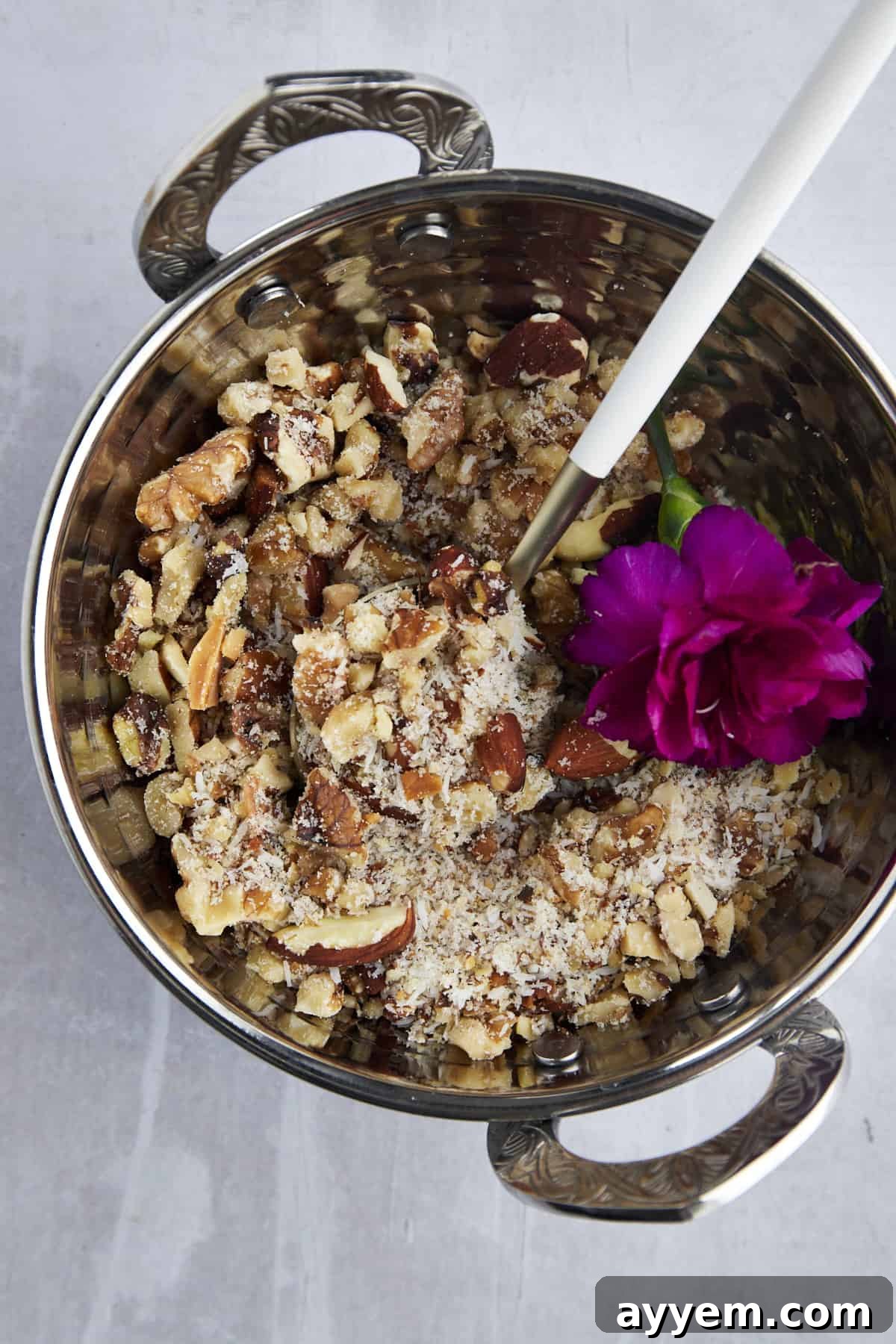 Bowl of chopped nuts with sugar and cinnamon for Qatayef filling.