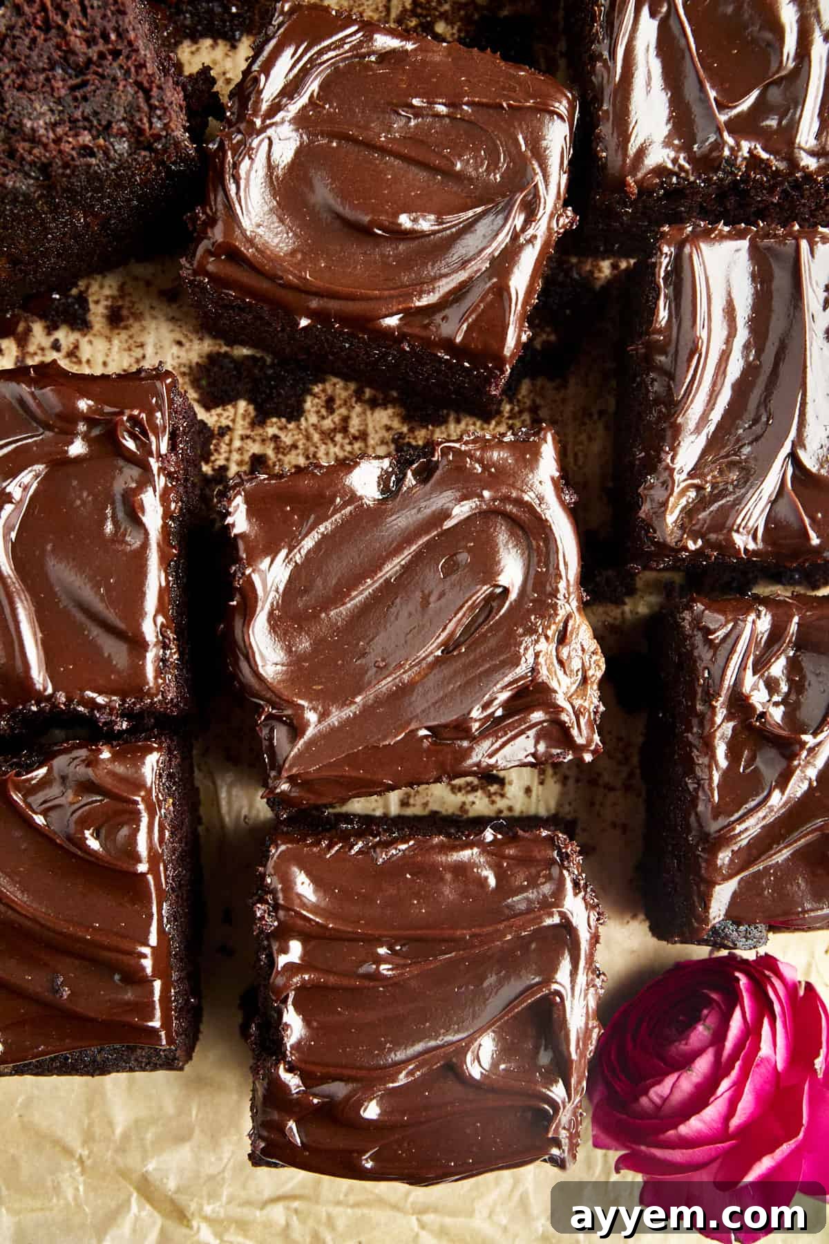 Squares of chocolate frosted chocolate zucchini cake. 