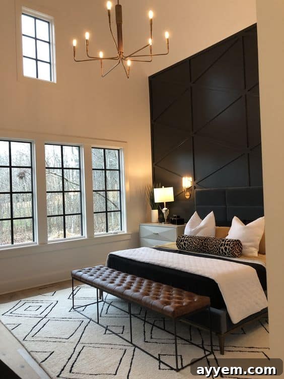 A finished wood plank black accent wall, showcasing a striking geometric design in a modern bedroom.