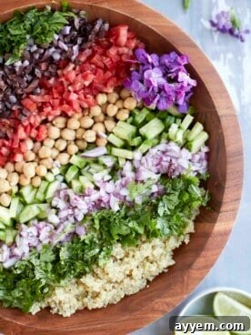 A vibrant Mediterranean Quinoa Salad, packed with healthy plant-based protein and fresh vegetables.