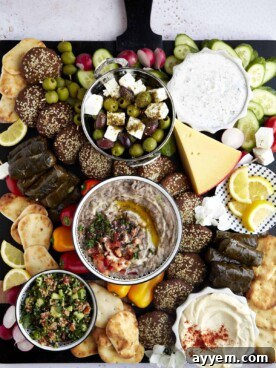 An overhead view of a large, inviting Mediterranean Mezze Platter, perfect for sharing.