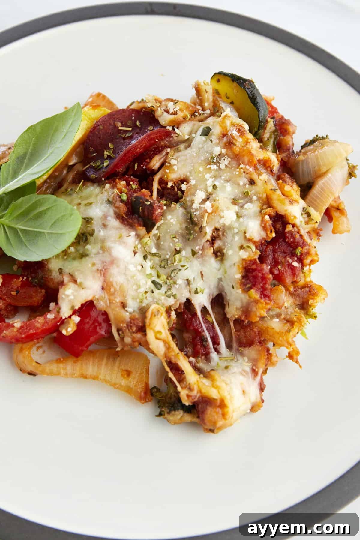 Sheet pan veggie pizza bake on a plate. 