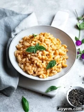A hearty bowl of golden-brown easy baked mac and cheese, perfectly crusted with panko and ready to be enjoyed.