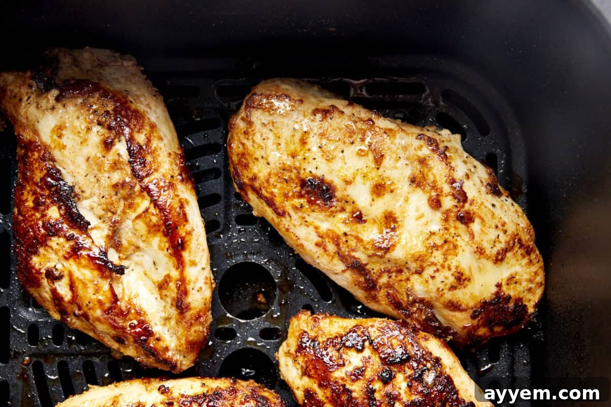 Classic Greek Lemon Chicken 4 Perfectly cooked lemon garlic chicken breasts, golden brown and ready to eat.