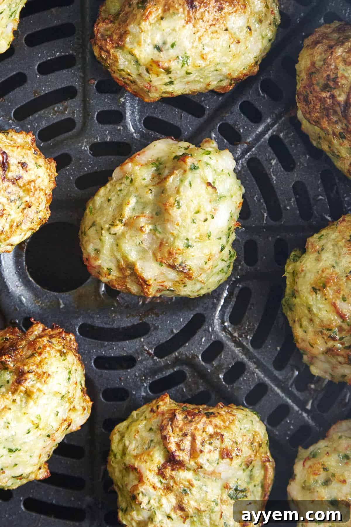 Cooked shrimp kofta meatballs in an air fryer. 