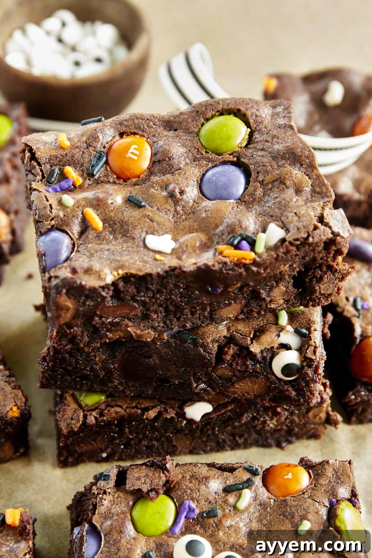 A stack of three Halloween brownies. 