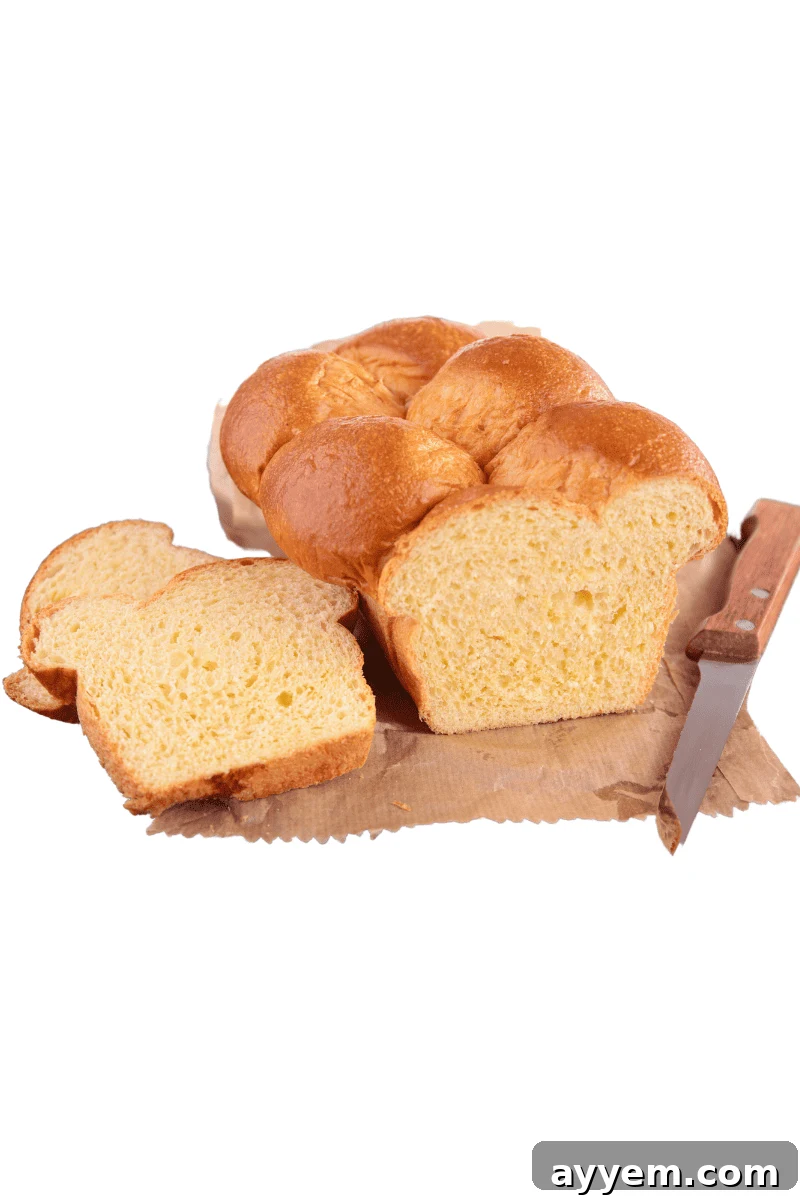 Bricohe bread, perfectly cubed for soaking in custard.