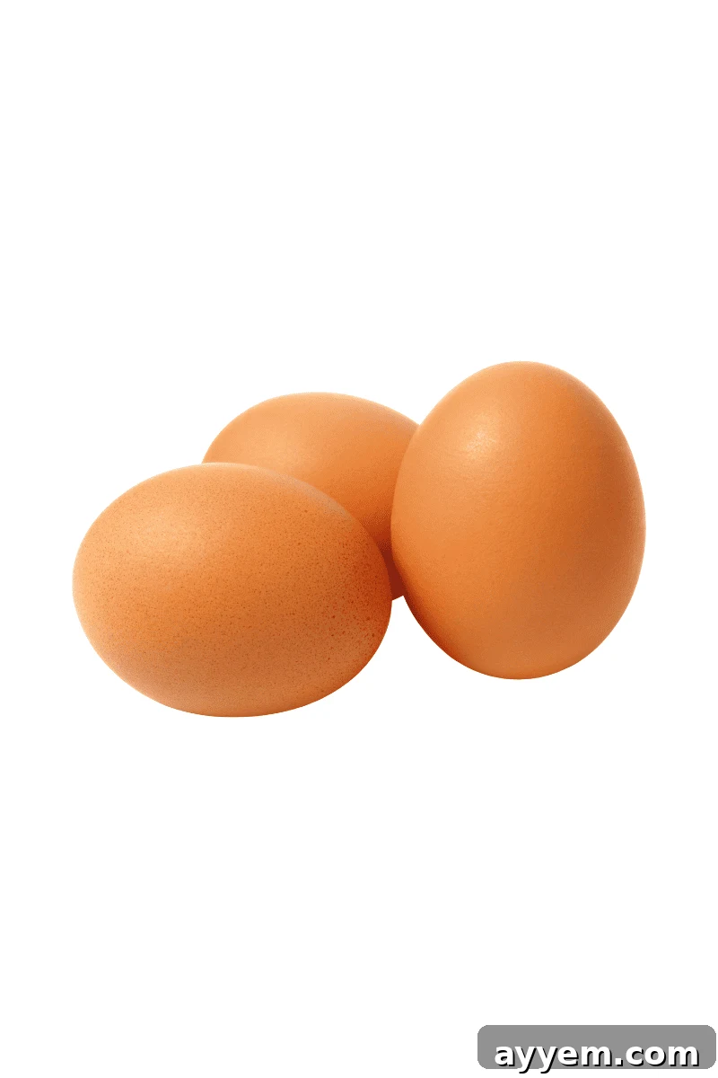 Fresh large eggs, essential for a rich custard base.