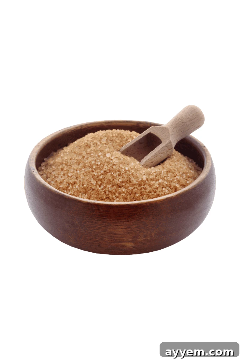A bowl of light brown sugar, adding caramel notes.