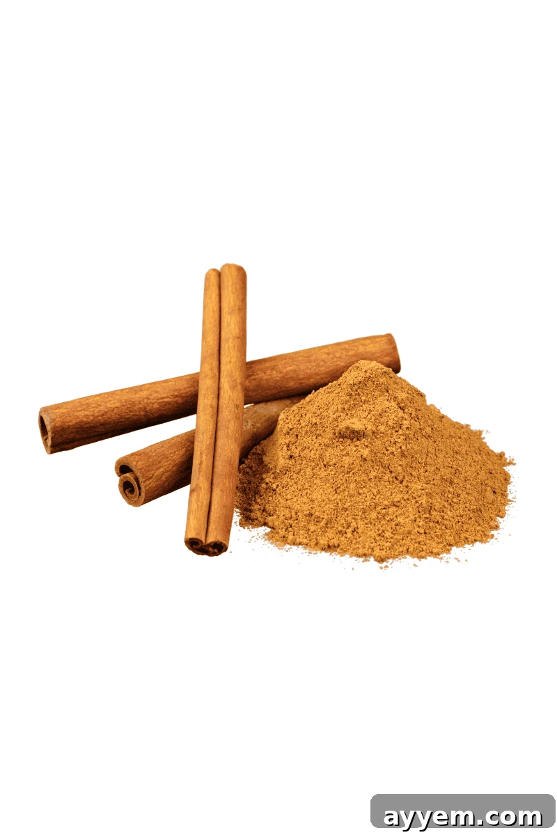 Ground cinnamon and cinnamon sticks, for aromatic warmth.