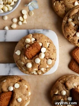 Delicious White Chocolate Biscoff Cookies on a cooling rack, showcasing their rich, bakery-worthy texture and inviting appearance, perfect for a weekend treat.