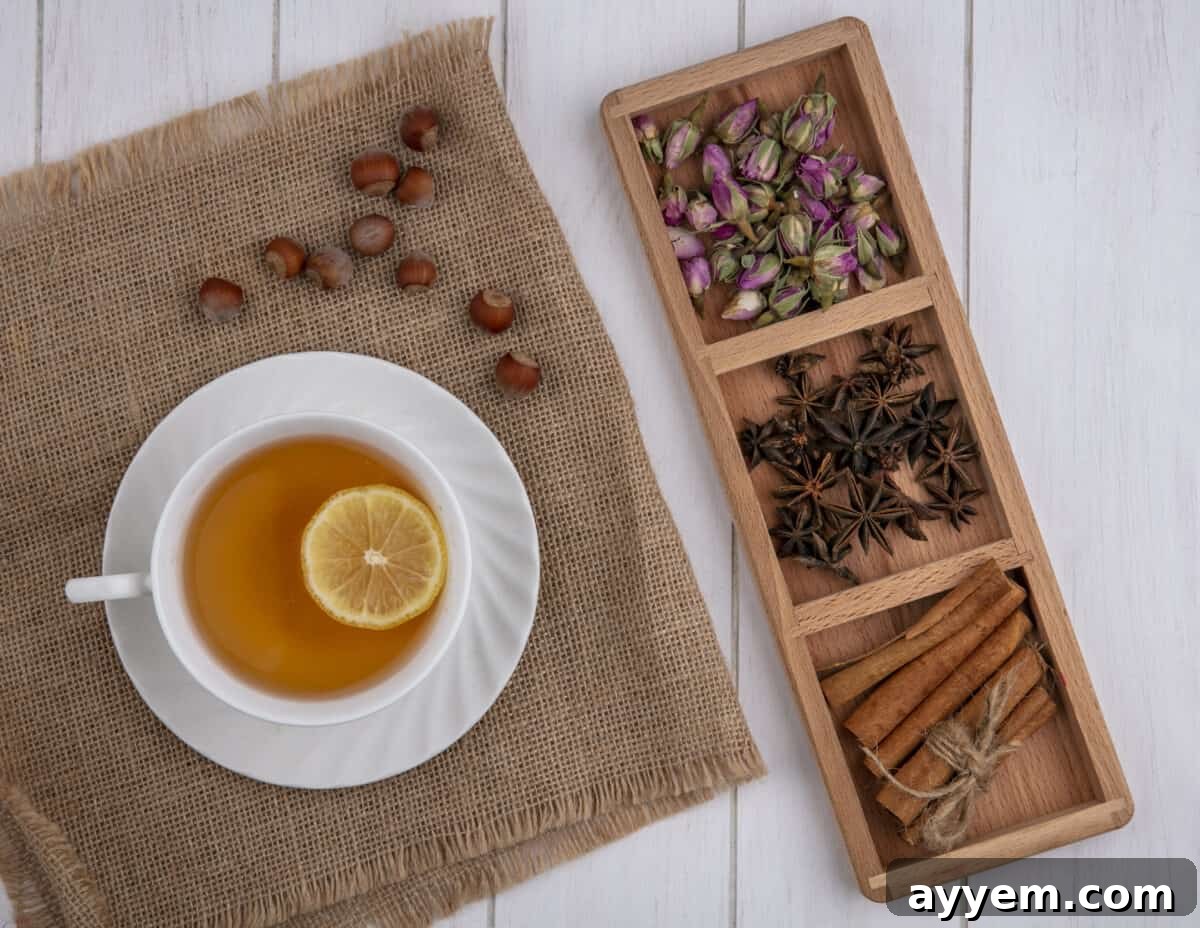 cup of tea next to container with spices.