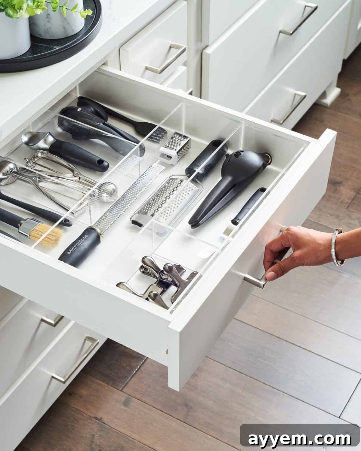open drawer of kitchen utensils.