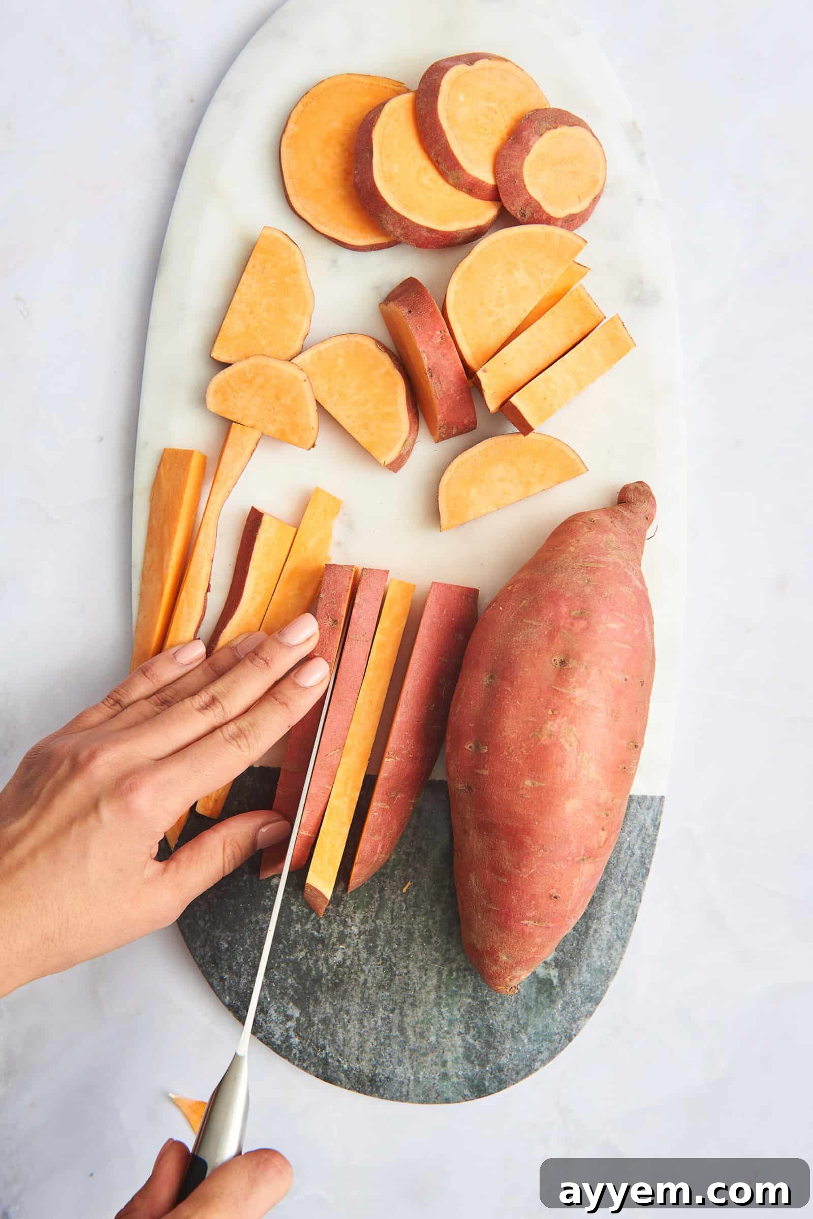 A plate of perfectly cut sweet potato wedges, slices, and sticks.