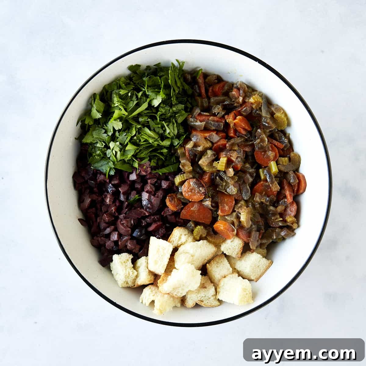 Bread dressing ingredients in a bowl.