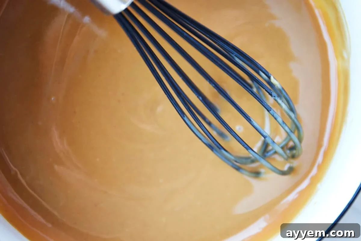 Peanut butter filling being whisked. 