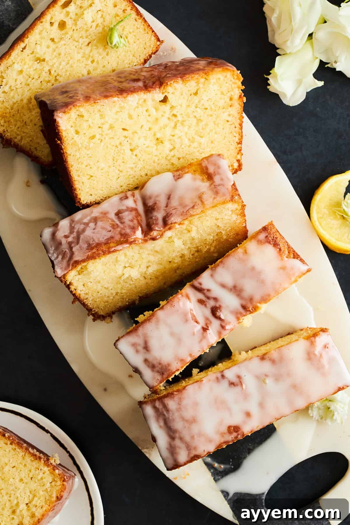 Slices of glazed Starbucks lemon loaf. 