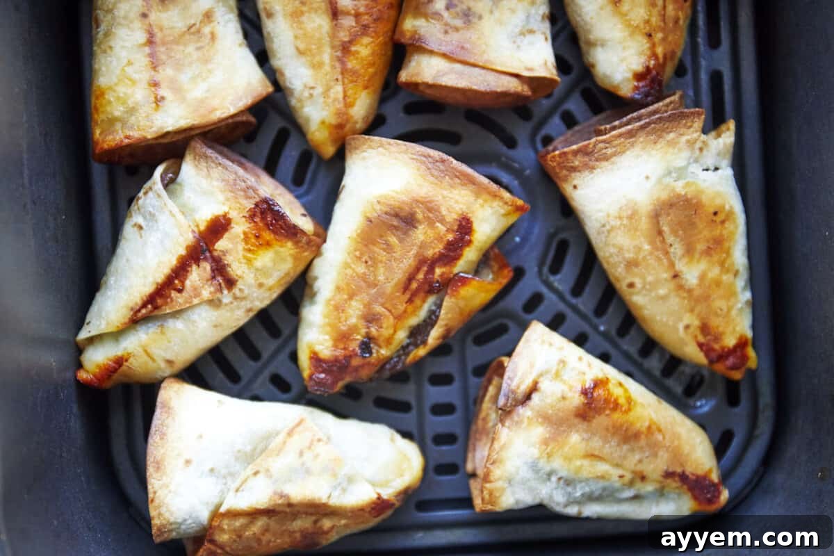Beef rolls in an air fryer.