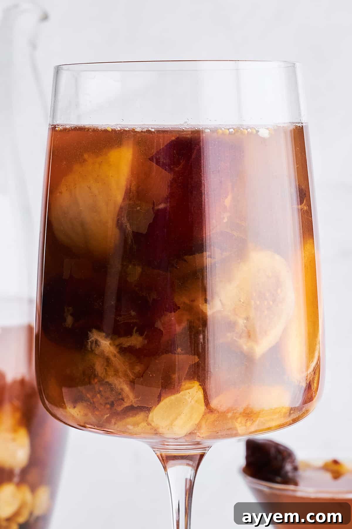 A wine glass elegantly presenting Khoshaf.