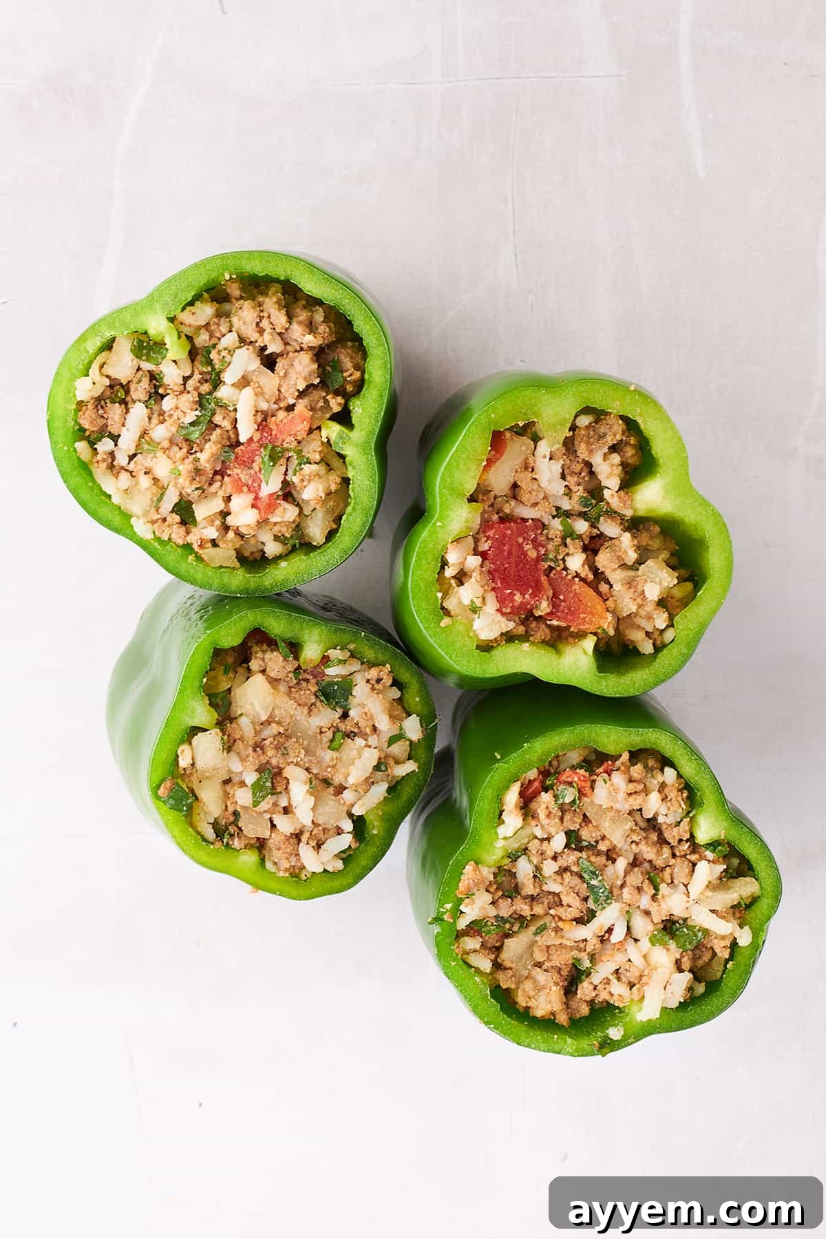 Peppers stuffed with a beef and rice filling.