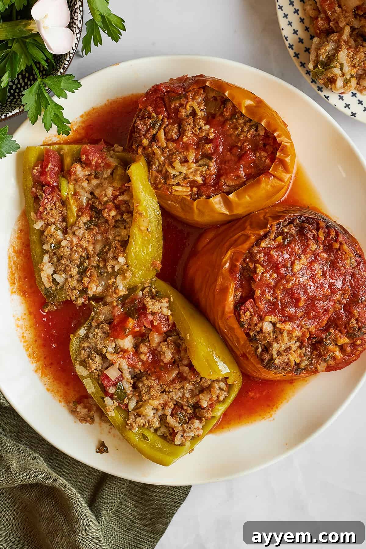 Slow cooker Mediterranean stuffed peppers with rice in a slow cooker.