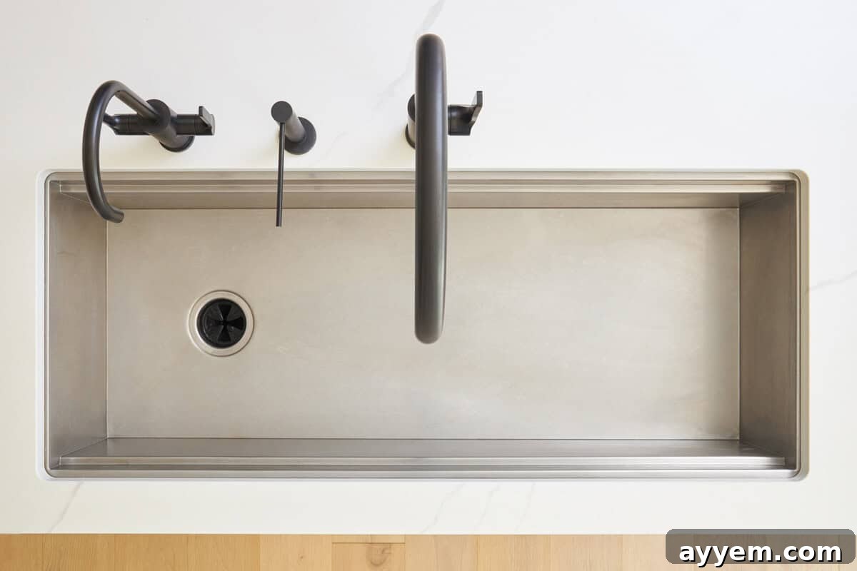 Unlock Your Kitchen's Potential: Workstation Design 4 Overhead image of a clean kitchen sink.