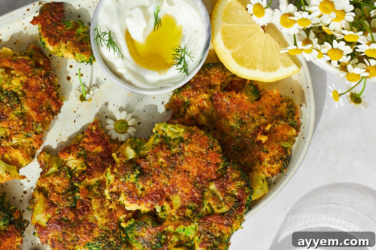 A plate of cheesy broccoli fritters.