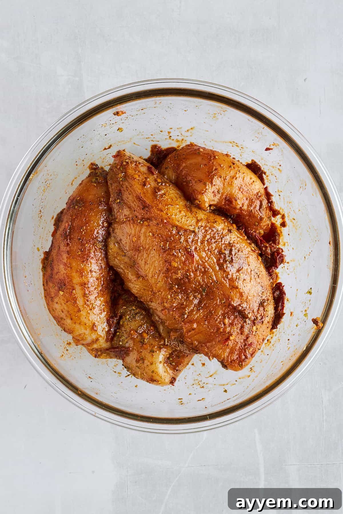 Seasoned raw chipotle chicken thighs. 
