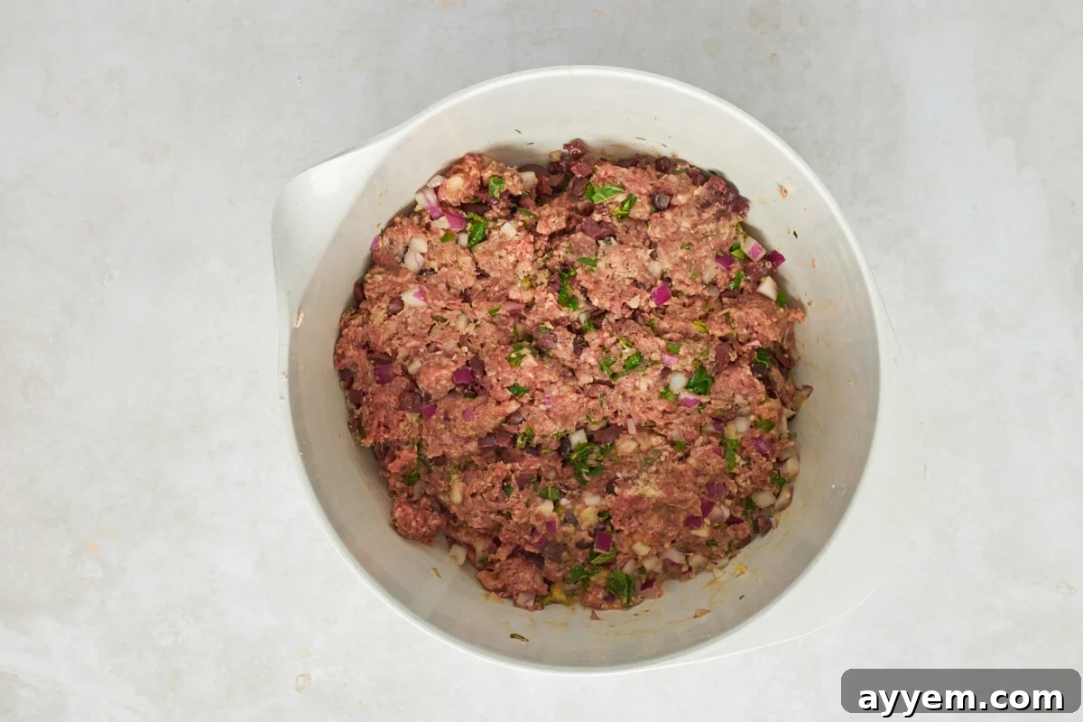 Mediterranean ground beef meatball mix in a bowl.