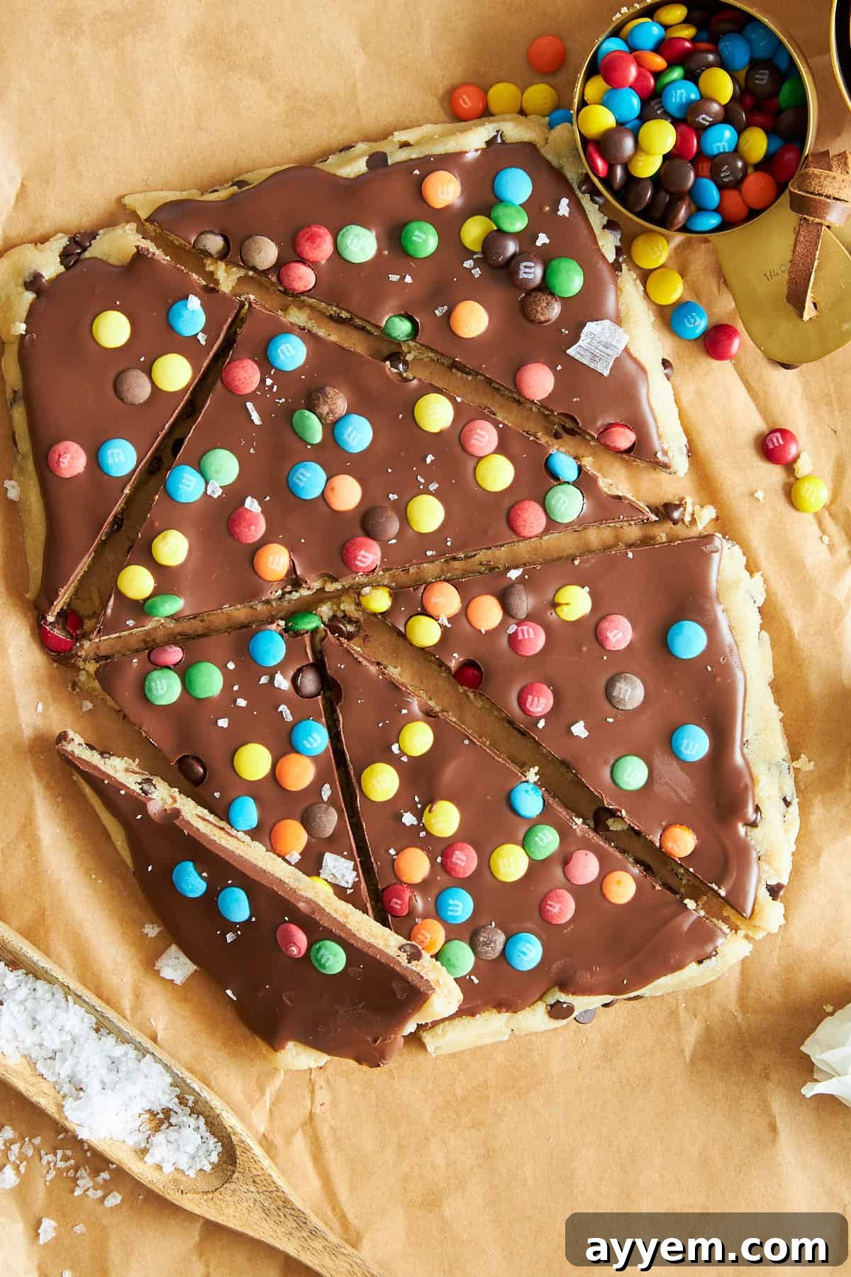 Crisp triangles of homemade chocolate chip cookie dough bark, arranged invitingly on a platter.