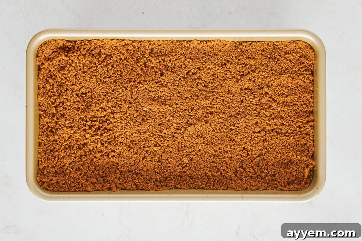 Biscoff crust topping over an upside-down cheesecake.