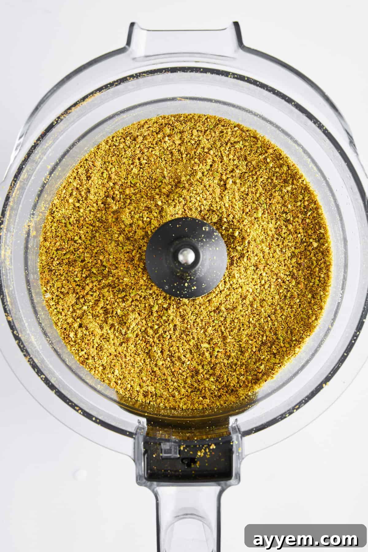 Blended pistachios in a food processor. 