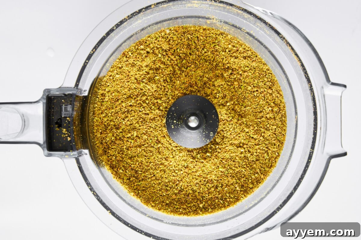 Blended pistachios in a food processor.