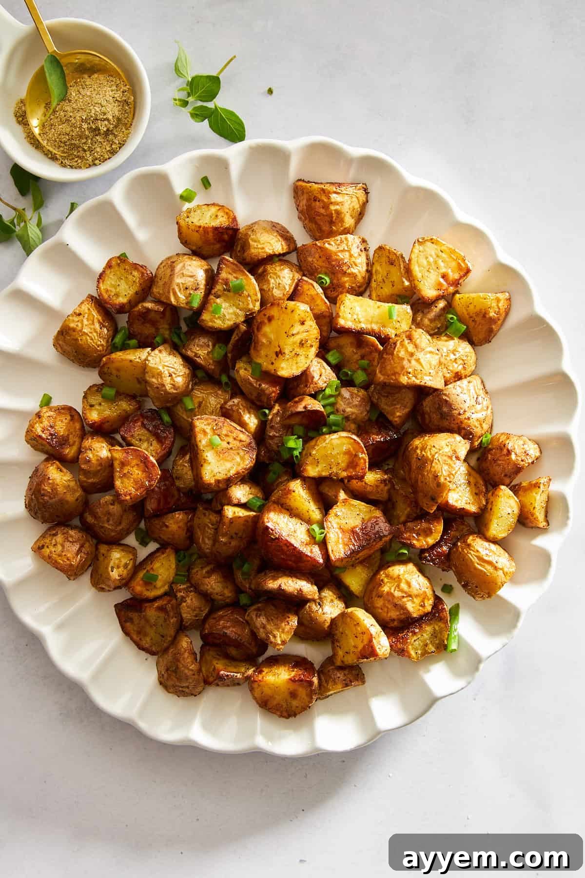 A plate of air fryer Greek potatoes. 