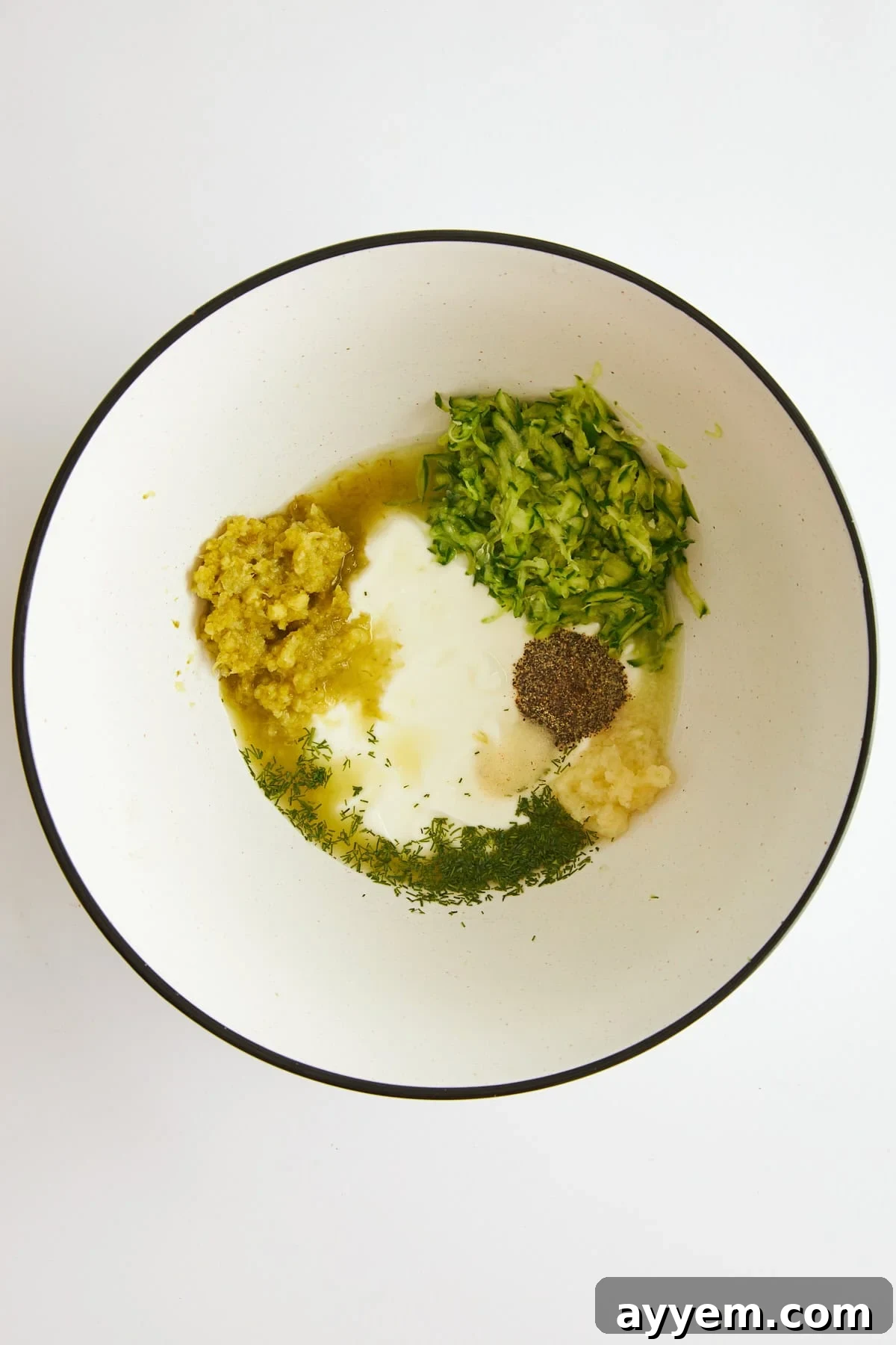 Ingredients for Tahini yogurt marinade, laid out before mixing.