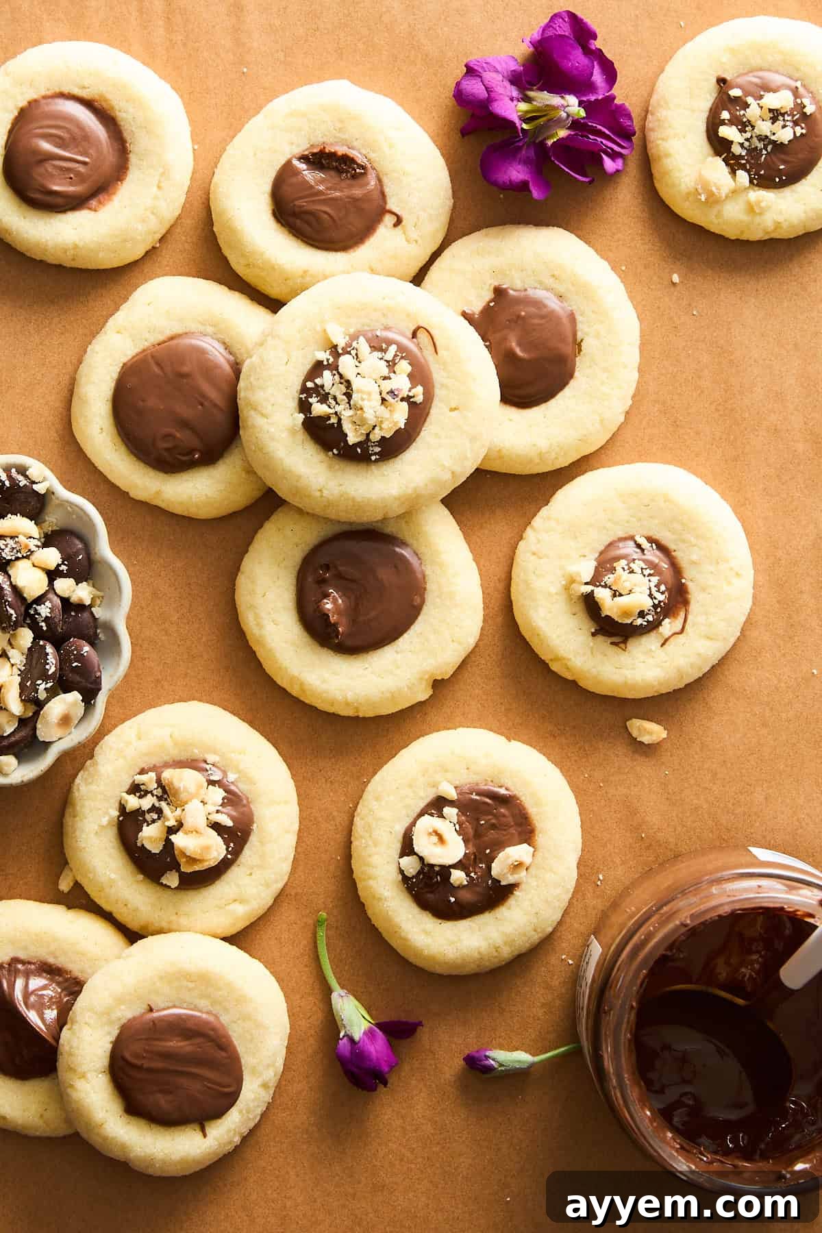 Classic Nutella thumbprint cookies with a rich chocolate hazelnut center.