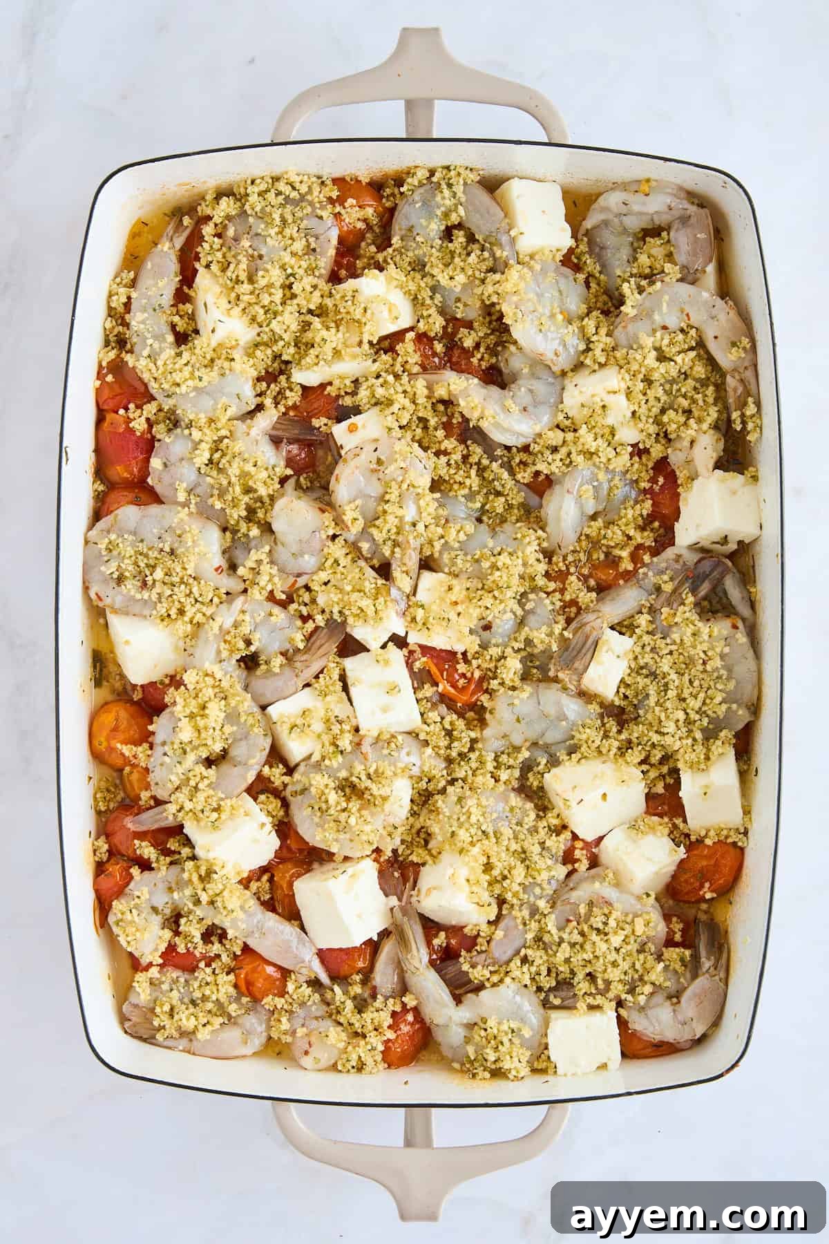 The Panko Shrimp and Feta Bake assembled with a layer of seasoned breadcrumbs on top, ready for the oven.