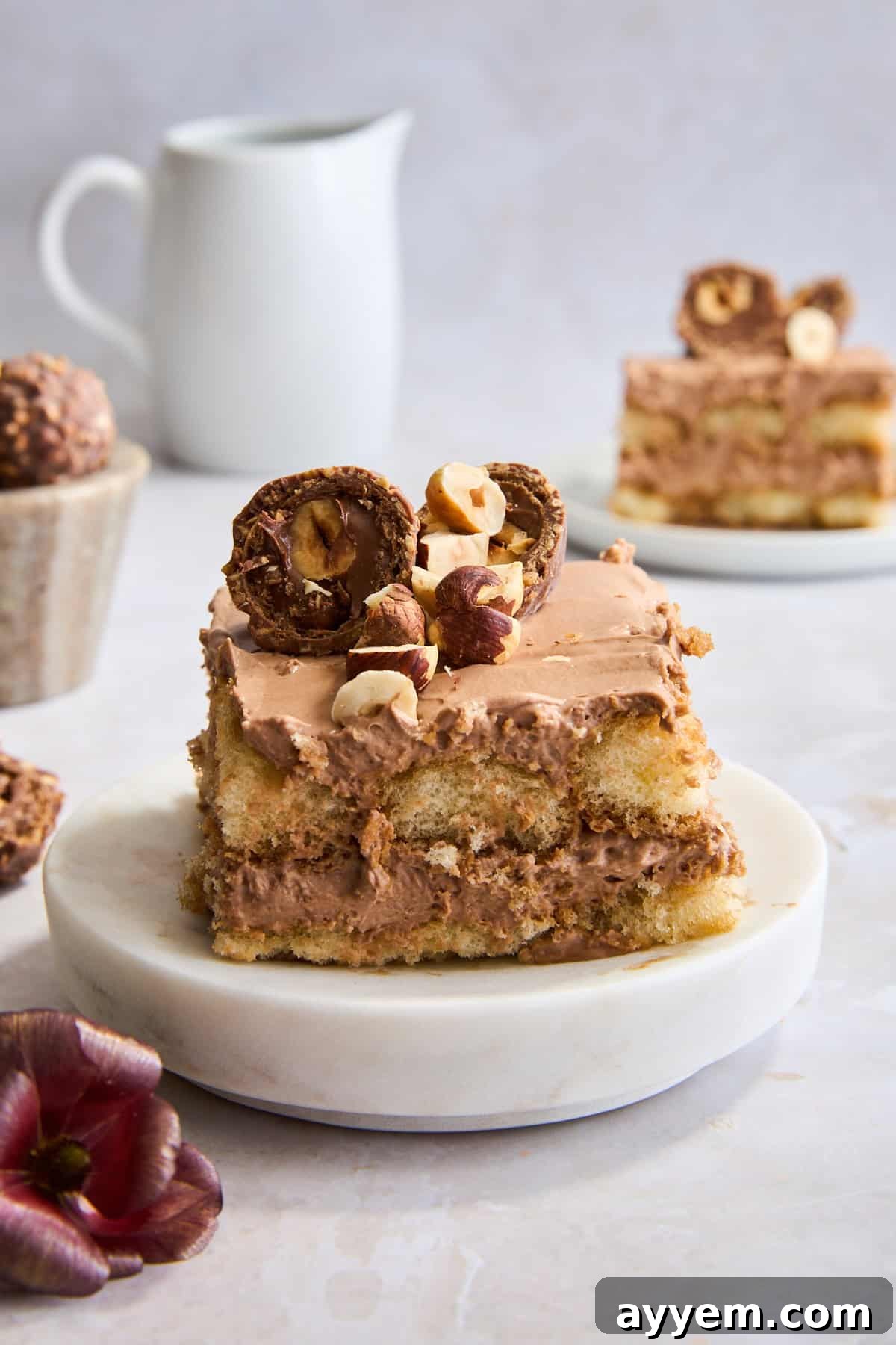 A slice of no-bake Nutella tiramisu on a plate. 