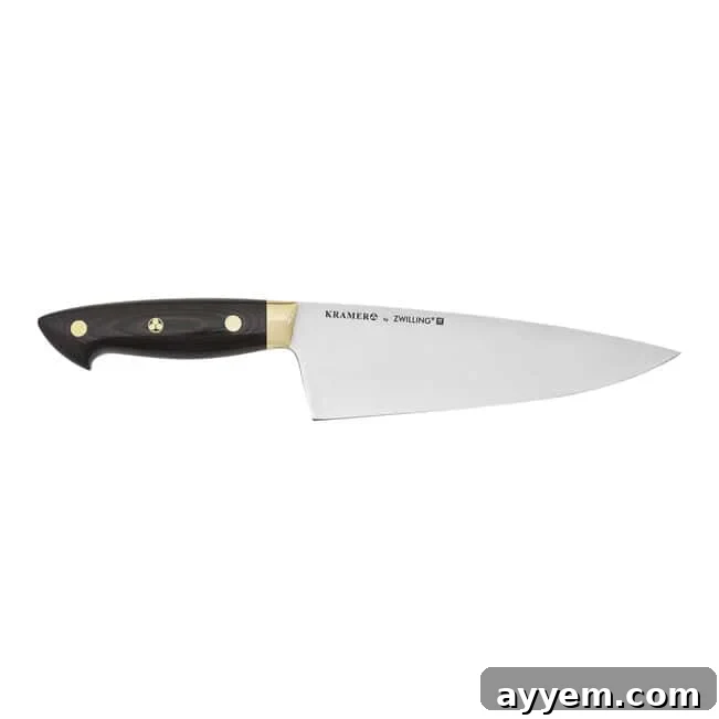 Crafting the Perfect Influencer Box: Our Secrets Revealed 8 A chefs knife with a shiny stainless steel blade.