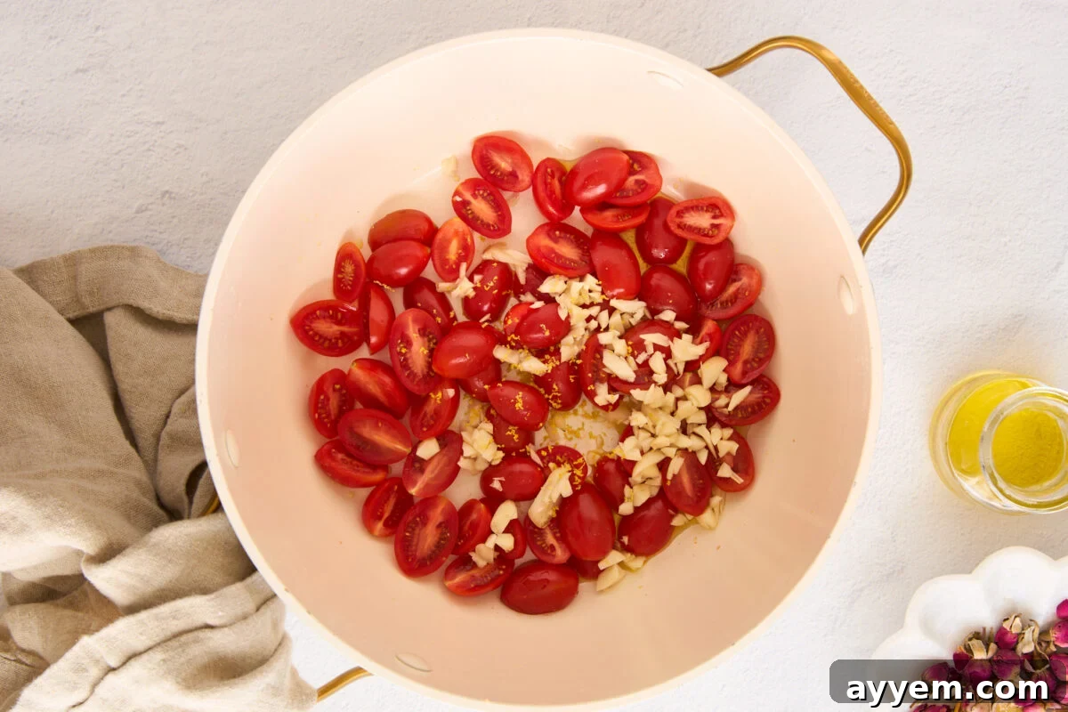 Tomatoes and garlic in a pasta pot.