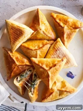 Baked fatayer on a plate.