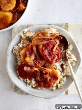 A bowl of sanyet el batates over vermicelli rice.