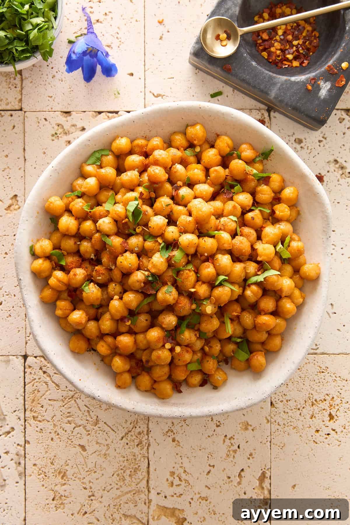 A bowl of crispy seasoned air fryer chickpeas.