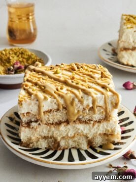 A slice of pistachio tiramisu on a plate.